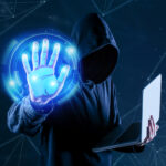 Hacker silhouette over crypto wallet graphics with a price tag of $100, representing the rise of affordable Drainer-as-a-Service tools in the dark web market.