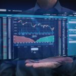 Stock market index board showing mixed performance with a Federal Reserve press briefing in the background and a calendar marked for June rate cut speculation.