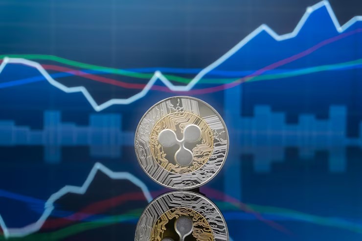 Ripple logo with a $25M stablecoin fund flowing into books, graduation caps, and classrooms—symbolizing the company’s initiative to enhance U.S. financial literacy.