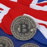 Bitcoin price chart surging past $100K with Trump and UK trade deal graphics in the background, highlighting market volatility amid geopolitical developments.
